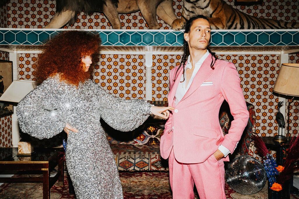 Fashion-forward bridal editorial image showcasing bold styling and texture for a maximalist wedding.