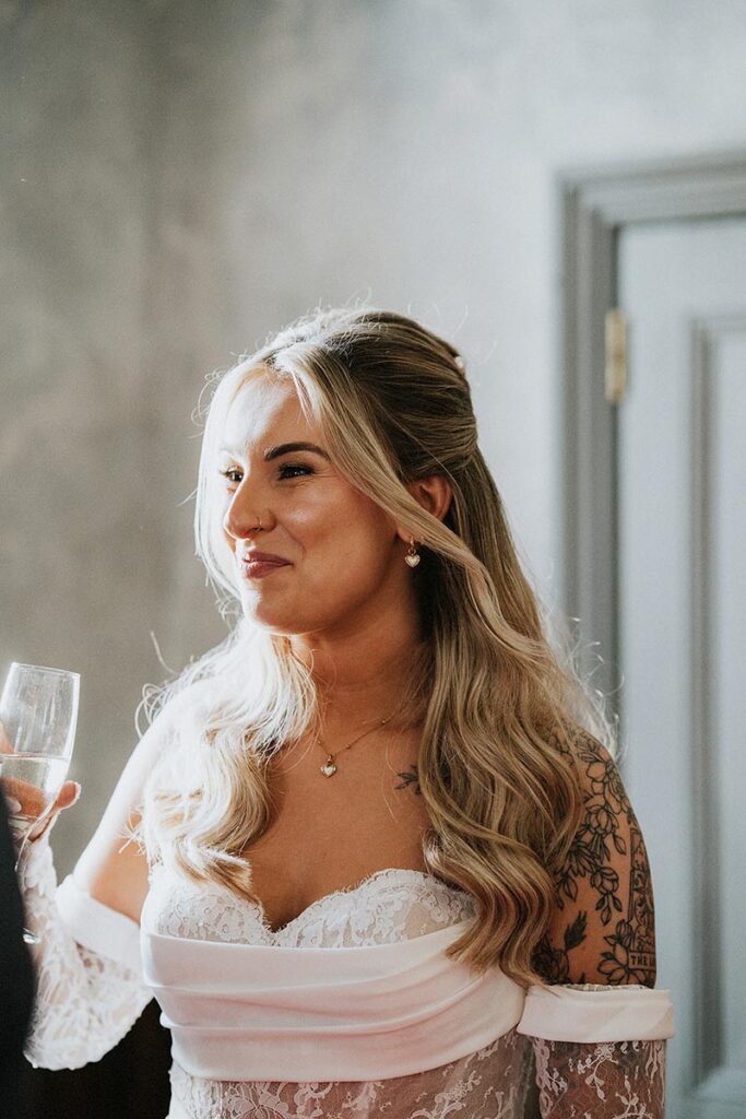 candid image of a bride laughing at relaxed pub wedding reception, The Joker Brighton